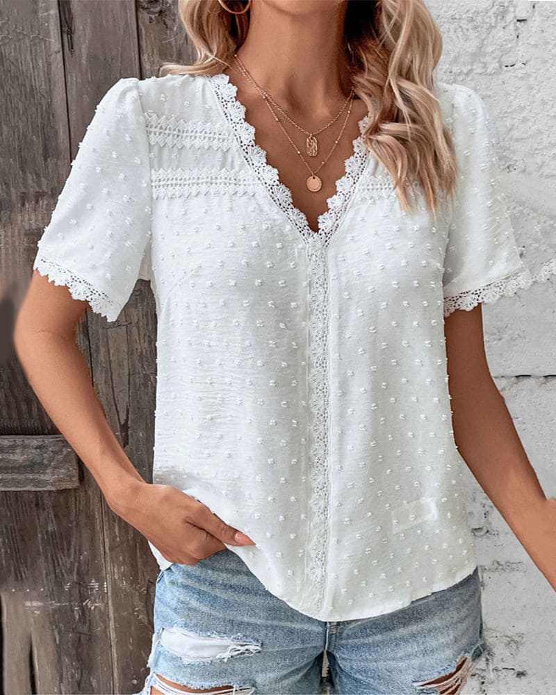 Blusa in Pizzo con Scollo a V e Maniche Corte per uno Stile Elegante Stile Italiano